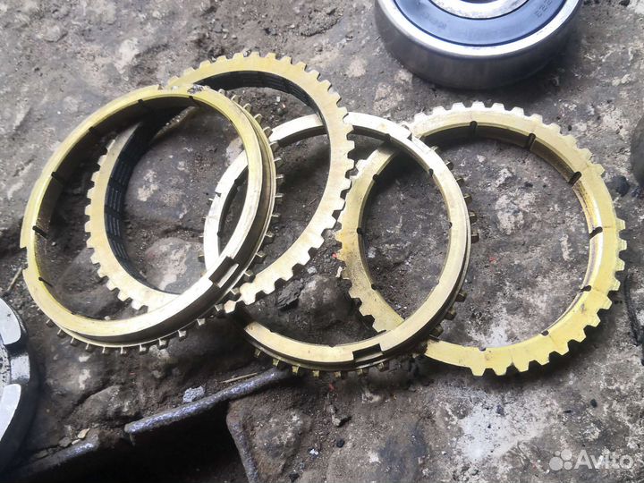 Синхронизаторы 1.2.3.4 пер подшипники роликовые