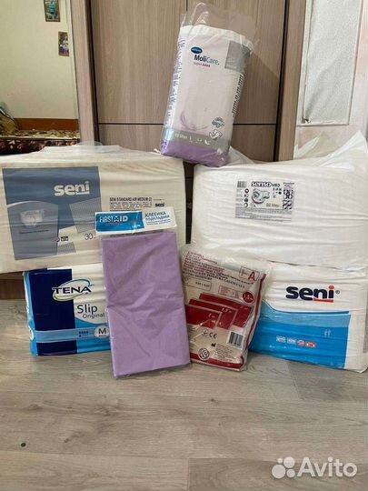 Памперсы, клеёнки для взрослых