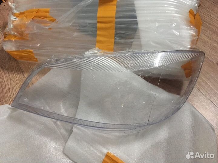 Стекло фары Опель Зафира А