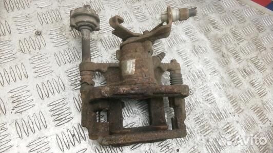 Суппорт тормозной задний левый opel astra J (SEA04