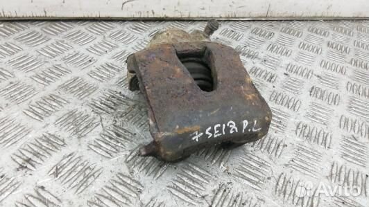 Суппорт тормозной передний левый skoda octavia A4
