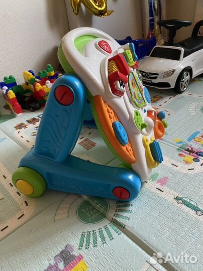 2в1 Ходунки каталка + развивающий столик