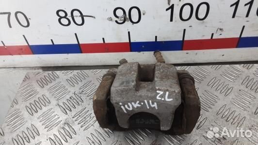 Суппорт тормозной задний левый toyota RAV 4 ZSA3