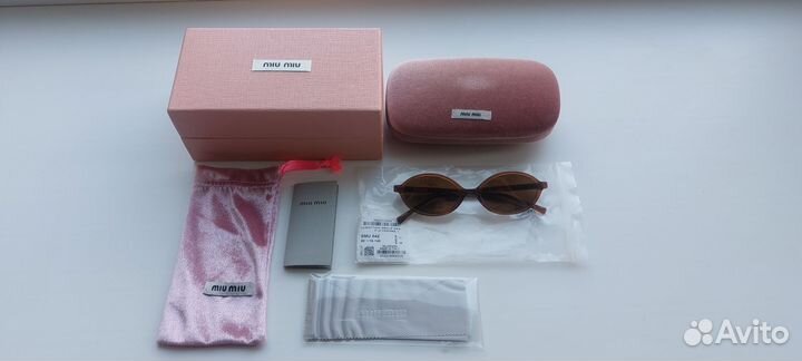 Солнцезащитные очки Miu miu