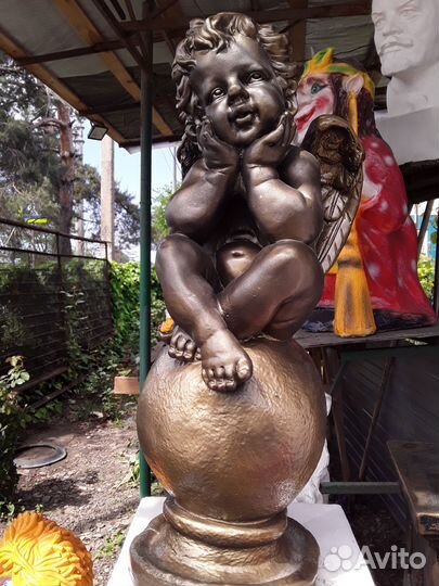 Садовые фигуры, львы, ангел на шаре