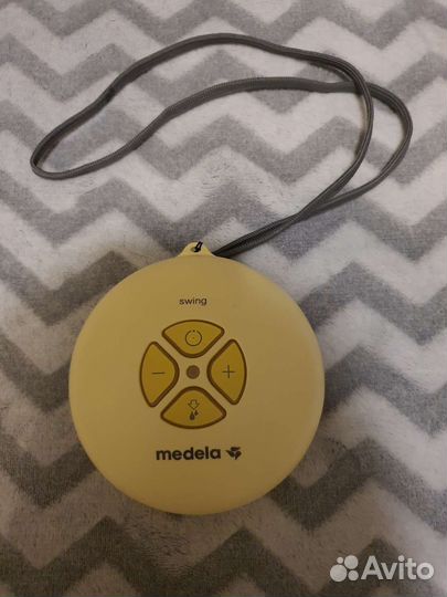 Молокоотсос medela электрический