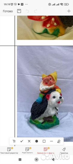 Статуэтка птицы