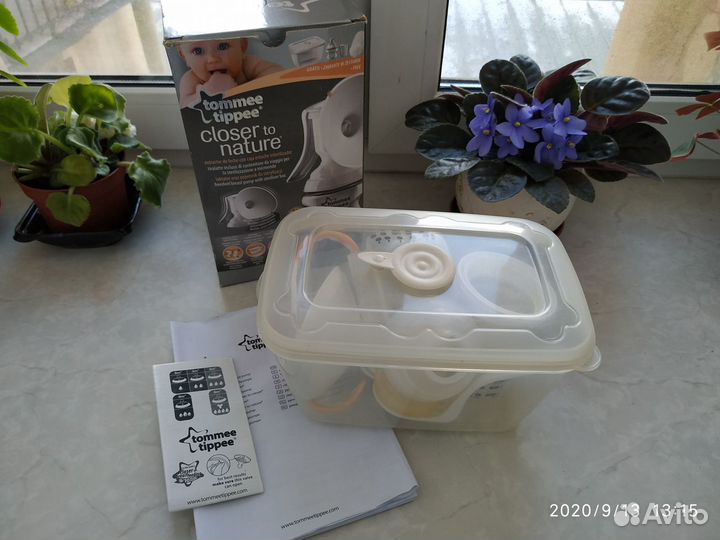 Молокоотсос Tommee tippee в контейнере ручной