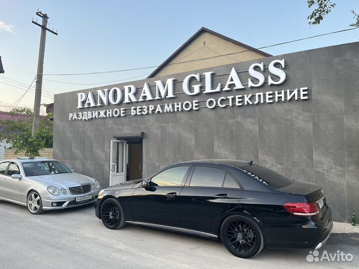 Раздвижное безрамное остекление