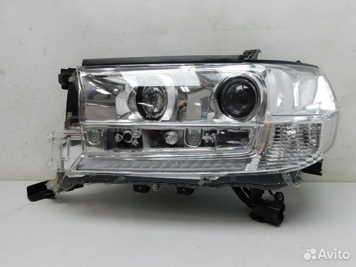 Фара левая Toyota Land Cruiser