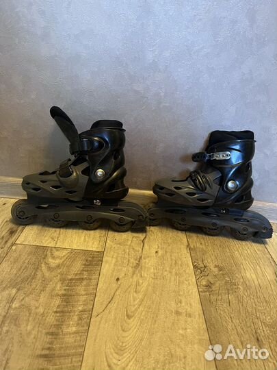 Роликовые коньки