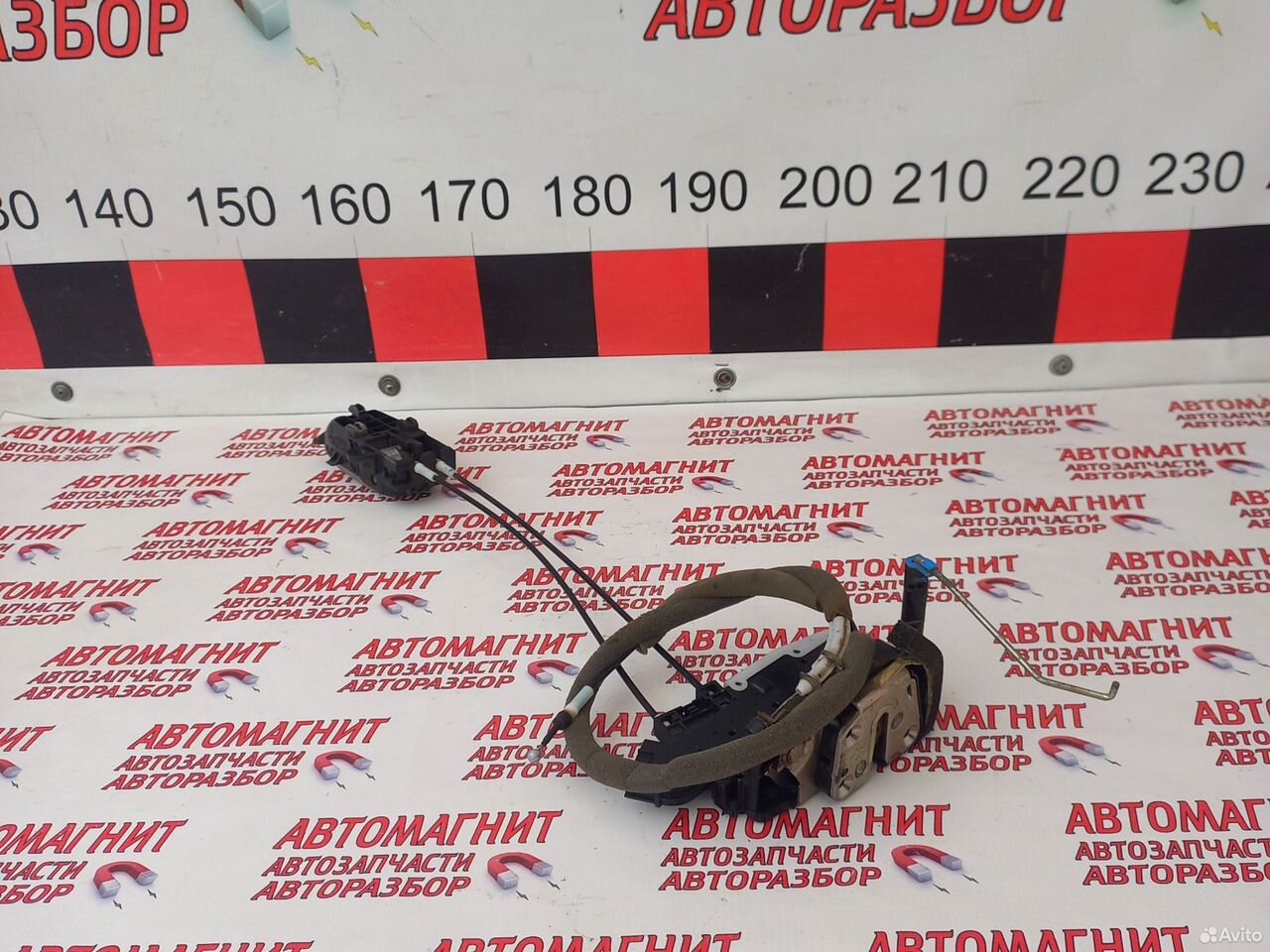 Замок передний левый Ниссан Алмера G15