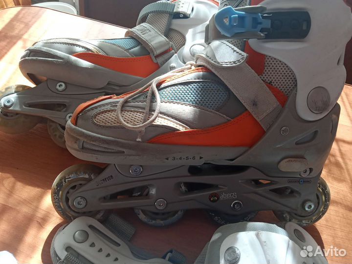 Роликовые коньки