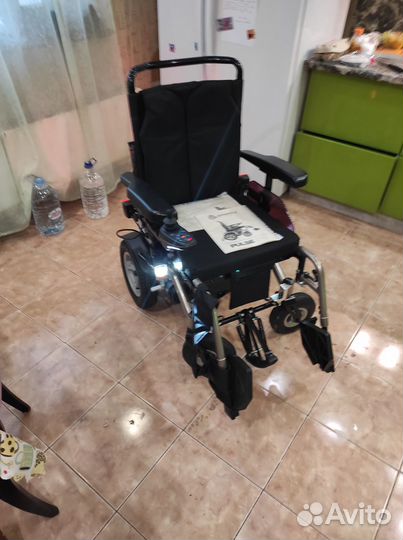 Инвалидная коляска с электроприводом