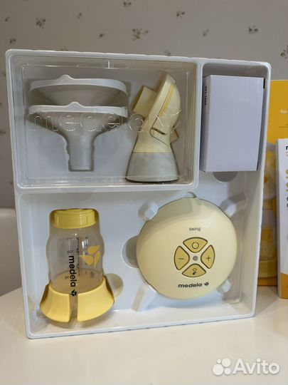 Молокоотсос medela swing flex электрический