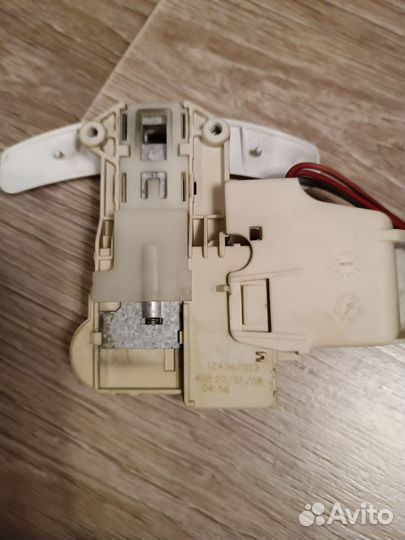 Блокиратор люка стиральной машины занусси