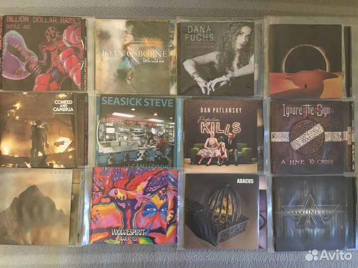Компакт диски с любимой рок-музыкой