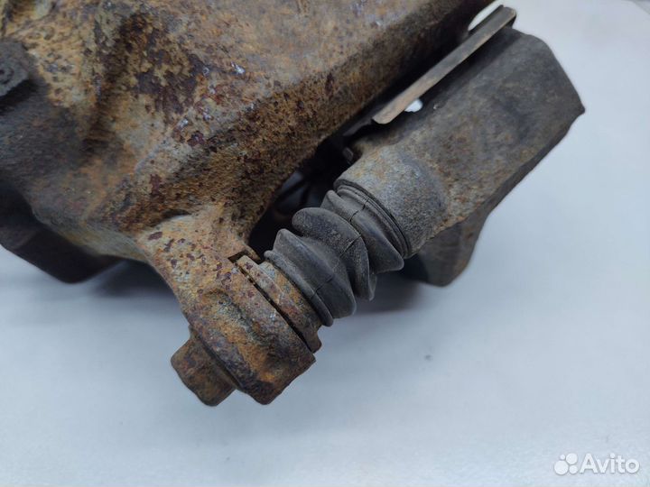 Суппорт тормозной передний левый Honda Domani MA4