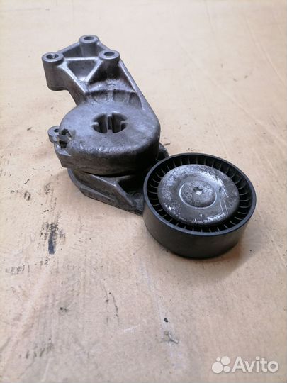 Натяжитель ремня VAG 06A903315F