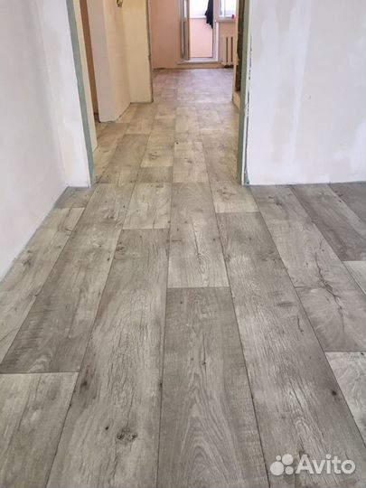 Укладка линолеума, ламината