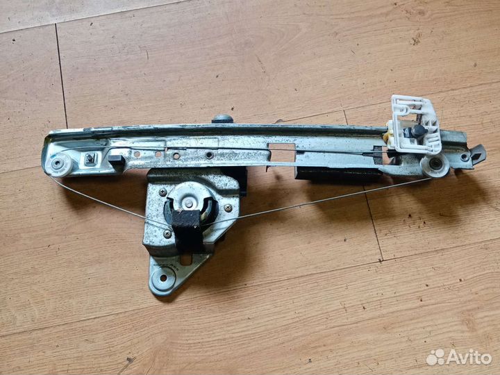 Задний левый эл.стеклоподьемник Рено Меган 2