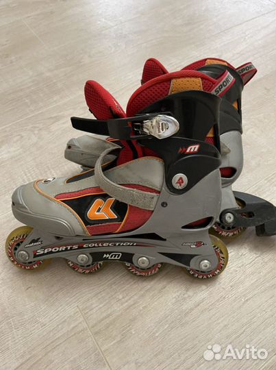 Роликовые коньки