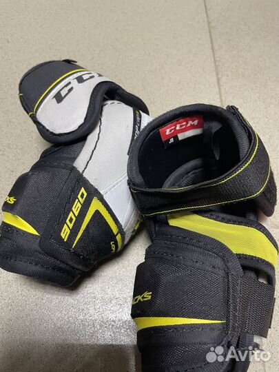 Налокотники хоккейные разные