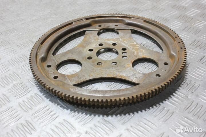 Маховик E 210