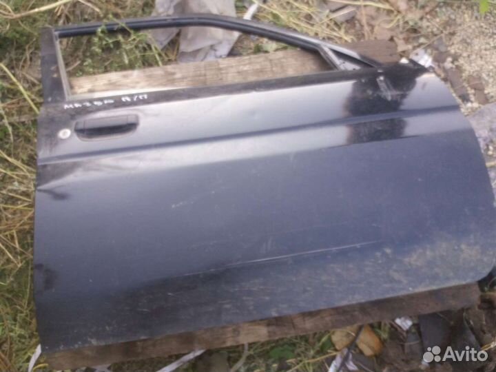 Двери Мазда демио