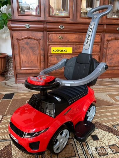 Машинка каталка с ручкой