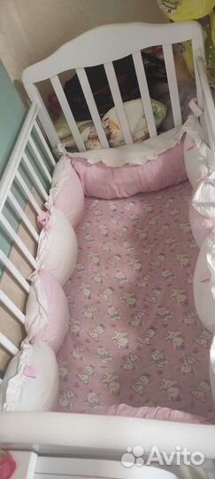 Детская кроватка с продольным маятником