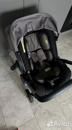 Коляска автокресло doona с базой isofix