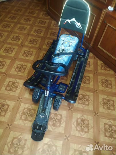 Детский снегокат на колесах