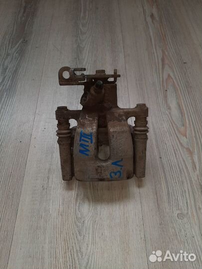 Суппорт тормозной задний Renault megane 3 Лев