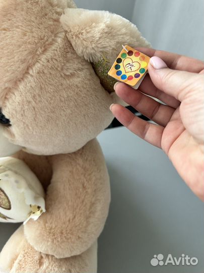 Плюшевый медведь
