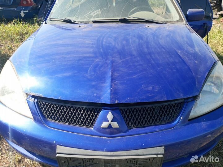 Капот Mitsubishi lancer 9