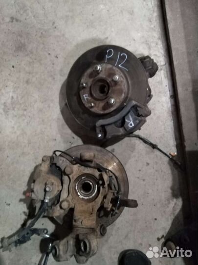 Кулак поворотный передний Nissan Primera P12