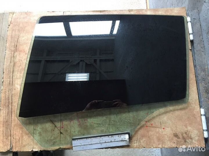 Стекло задней левой двери Опель Астра Н