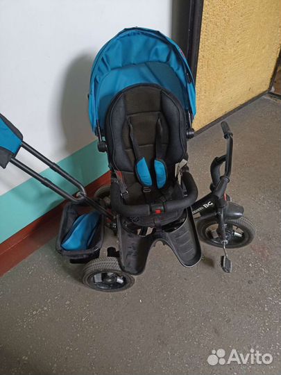 Трехколесный велосипед с поворотным сиденьем