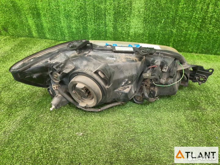 Фара передняя левая mitsubishi lancer cedia