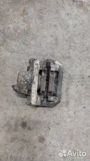 Суппорт тормозной передний левый Renault Logan