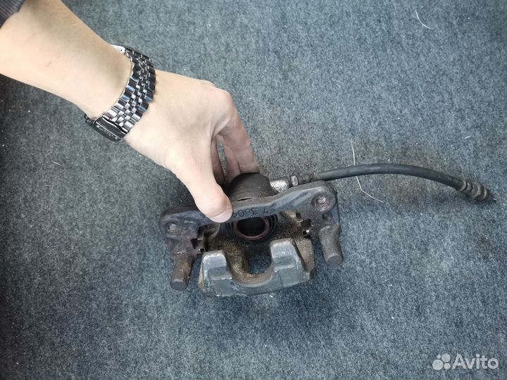 Тормозной суппорт левый задний лансер 9