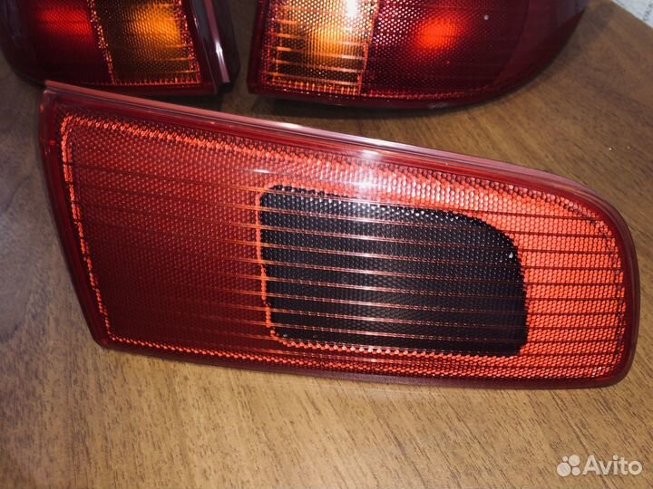 Фары задние Mazda demio 2002