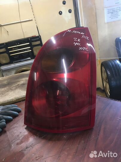 Левый задний фонарь Ниссан P12 универсал