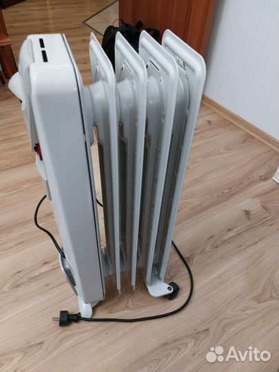Масляный обогреватель delonghi