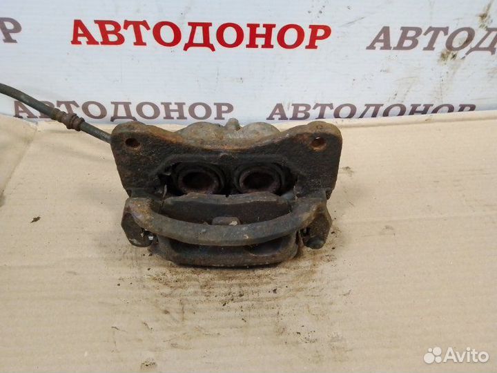 Суппорт тормозной передний левый Mazda Mpv