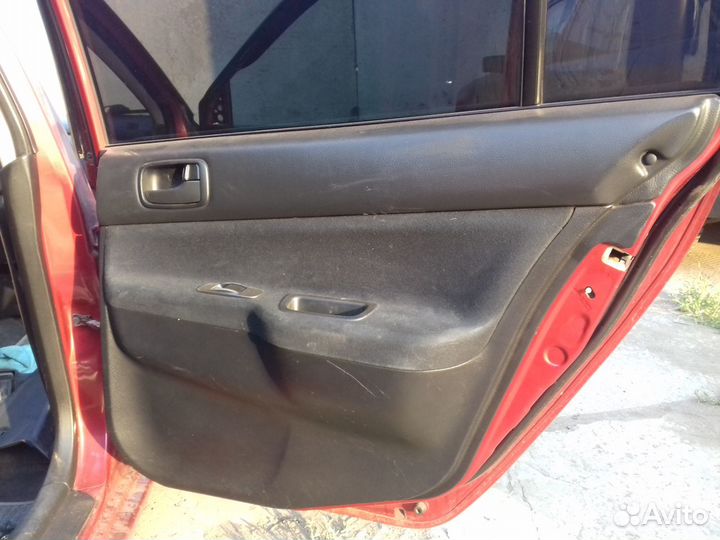 Обшивки дверей (салона) Mitsubishi Lancer 9