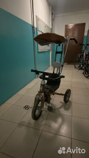 Трехколесный велосипед с ручкой