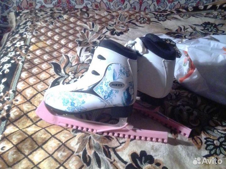 Роликовые коньки