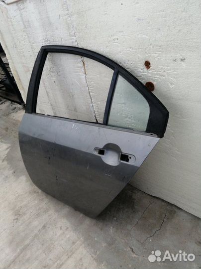 Дверь задняя левая Nissan Primera P12